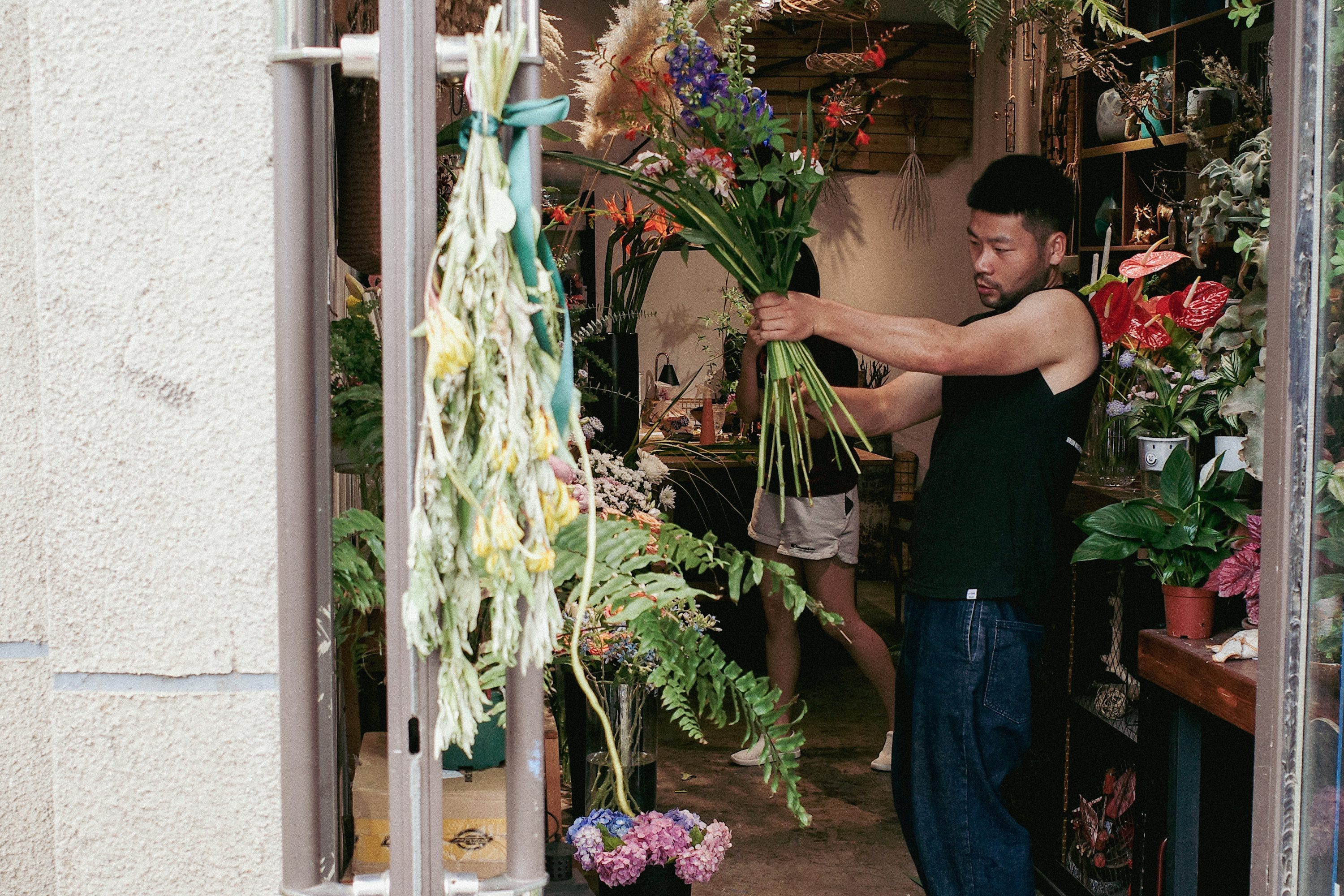 Person with Bouquette of flowers